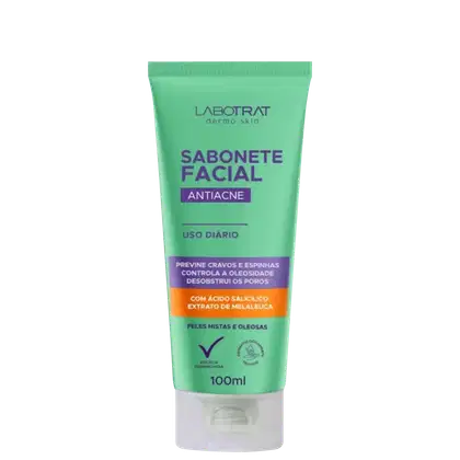 O produto apresentado é um sabonete facial antiacne da marca Labotrat, com embalagem em tubo de plástico verde e roxo. O rótulo indica que o produto é indicado para peles mistas e oleosas. O tubo possui 100ml de volume.