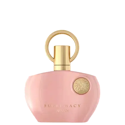 Frasco de perfume rosa com tampa dourada redonda e logotipo dourado da marca Supremacy by Afnan. O design é elegante e minimalista, com uma aparência luxuosa.