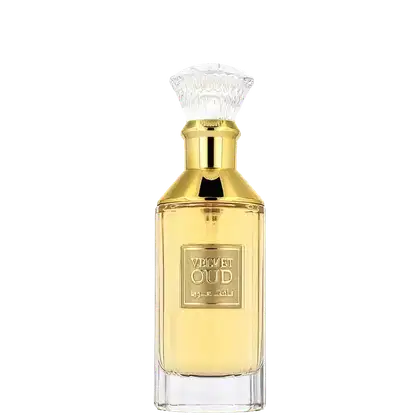 Frasco de perfume Velvet Oud da marca Lattafa Perfumes, com design elegante em dourado e vidro transparente, contendo líquido âmbar.