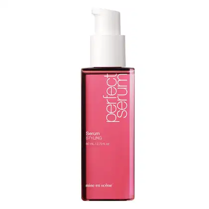 Frasco da marca Mise en Scène, com embalagem rosa vibrante e rótulo branco. O produto possui um design minimalista e uma bomba de aplicação.