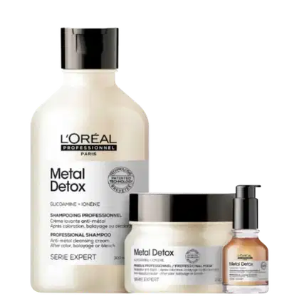 A imagem mostra um kit L'Oréal Professionnel com um frasco arredondado de shampoo, um pote redondo de máscara capilar, ambos de cor branca, com rótulo branco e tampa preta. Além de um spray de óleo.