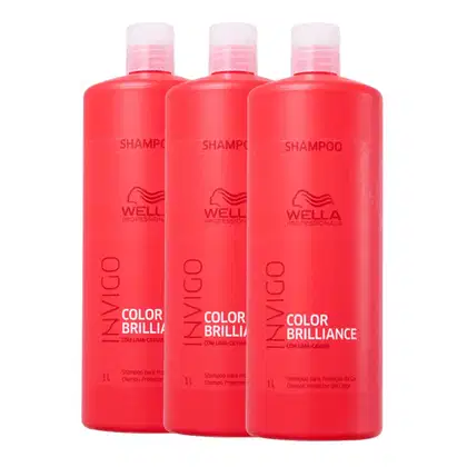 A imagem mostra três embalagens de 1 litro cor vermelha de shampoo.