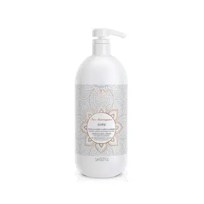 Frasco branco com bomba dosadora contendo shampoo da marca Amend Cosméticos. Rótulo com design ornamental em tons de cinza e dourado, indicando o nome do produto "Óleo Marroquino".