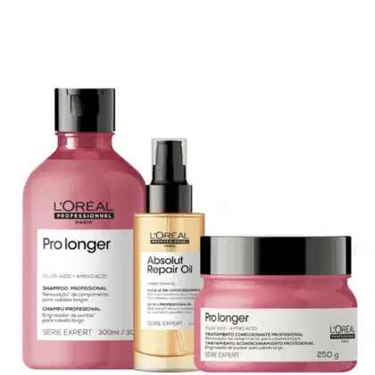 A imagem mostra um kit da L'Oréal Professionnel Pro Longer com um frasco arredondado de shampoo, um frasco plástico dourado com aplicador spray preto e um pote redondo de condicionador. Todos com rótulo branco e tampa preta.