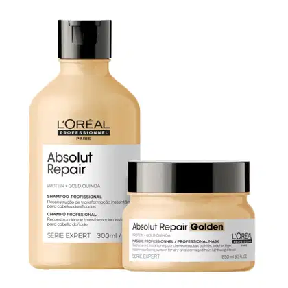 A imagem mostra um kit com dois produtos da linha Absolut Repair da L'Oréal Professionnel. Um frasco de shampoo de 300ml e um pote redondo. Todos com cor bege e tampa preta.