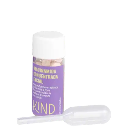 A imagem mostra um frasco pequeno de um produto, transparente com comprimidos. O rótulo é roxo, escrito em amarelo e cinza o nome do produto, ativos e efeitos na pele, além da marca em destaque. ao lado do frasco, um conta-gotas transparente de plástico.