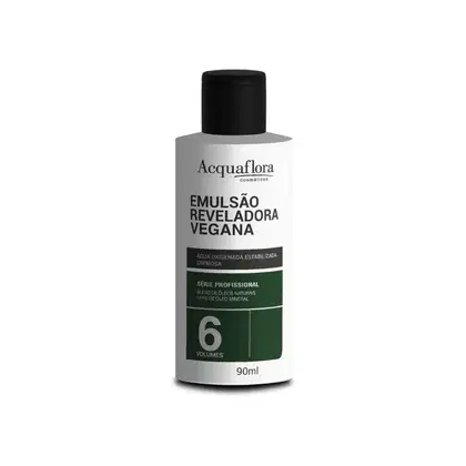 Emulsão reveladora vegana da linha profissional Acquaflora, em frasco plástico branco e preto com 90ml, contendo informações sobre a água oxigenada estabilizada e cremosa.