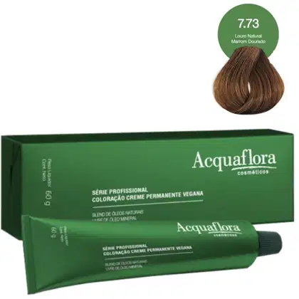 Caixa verde da série profissional de coloração creme permanente vegana da marca Acquaflora, contendo um tubo de coloração na tonalidade 7.73 Louro Natural Marrom Dourado.