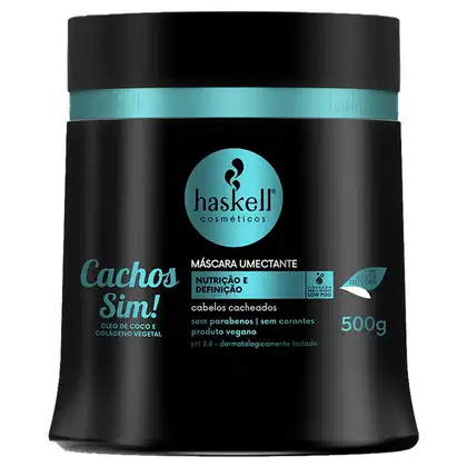 Máscara umectante da linha Cachos Sim! da marca Haskell Cosméticos. A embalagem é um pote preto com uma faixa verde-azulada e o logotipo da marca. O produto é indicado para cabelos cacheados e possui volume de 500g.