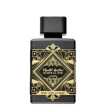 Frasco de perfume preto e dourado da marca Lattafa Perfumes, com rótulo em estilo art déco exibindo o nome "Badeeal Oud" e a descrição "Oud for Glory". O design é elegante e sofisticado, com detalhes decorativos dourados.