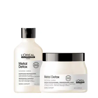 Dois produtos de cuidados capilares da linha Metal Detox da L'Oréal Professionnel. Um é um shampoo profissional em um frasco branco com tampa preta. O outro é uma máscara profissional em um pote branco com tampa preta.