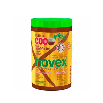A imagem mostra o Creme de Tratamento Novex Óleo de Coco 1kg, da marca Embelleze. A embalagem traz tons de marrom e dourado, além de ilustração de coco. O rótulo destaca que é um "Creme de Tratamento Ultraprofundo" e nutritivo.