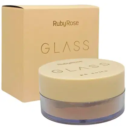 Pó solto da marca Ruby Rose, chamado "Glass". O rótulo na embalagem exibe o nome da marca "Ruby Rose" e o nome do produto "Glass" em letras douradas. A caixa de papelão que acompanha o produto também é bege, com o nome "Ruby Rose Glass" impresso nela.