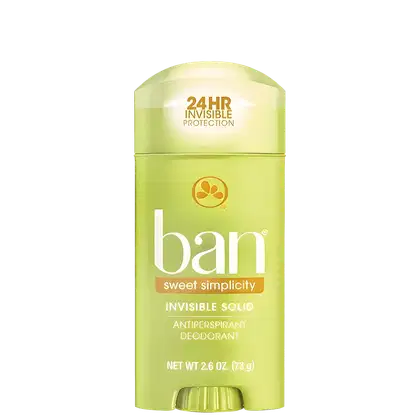 A imagem mostra um desodorante antitranspirante em barra sólida da marca Ban. O produto é embalado em um caso plástico cilíndrico de cor verde clara. Na parte superior, há uma Tampa protetora transparente.