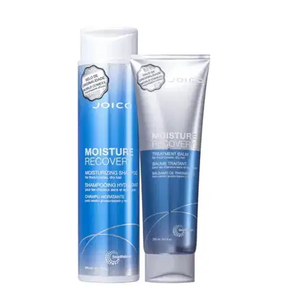 A imagem mostra um shampoo em  um frasco cilíndrico azul com rótulo branco e detalhes prateados. Ao lado está uma máscara capilar em embalagem tubular azul e prata, trazendo no rótulo informações na cor branca.
