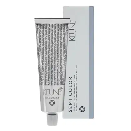 Tubo de tinta de cabelo da marca Keune, com embalagem branca, prata e preta, contendo o texto "Semi Color" e "Keune" em destaque. 