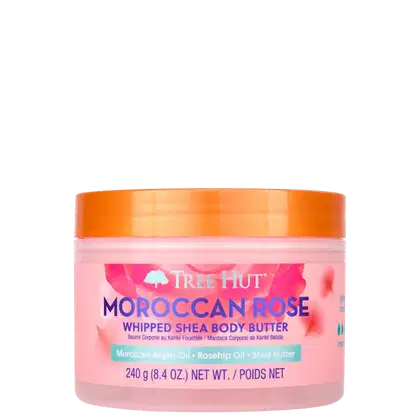 Pote de manteiga corporal em tons de rosa e laranja da marca Tree Hut, com rótulo indicando o produto "Moroccan Rose Whipped Shea Body Butter" e informações sobre os ingredientes, peso e marca.