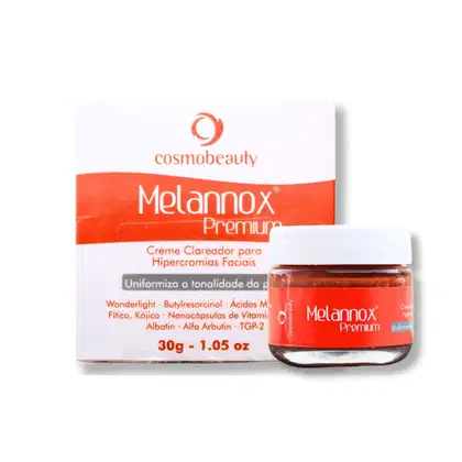Creme clareador para hipercromias faciais da marca Melannox Premium. O produto em si é um pote de vidro com tampa, também na cor laranja, contendo 30g do creme.