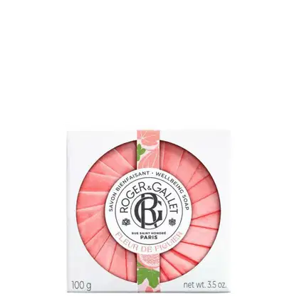 Sabonete em barra redondo da marca Roger & Gallet, com embalagem rosa e branca, exibindo o logotipo da marca e informações sobre o produto "Fleur de Figuier".