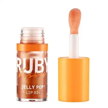 A imagem mostra um frasco de 4ml de lip oil transparente com detalhe laranja, aberto, com a tampa ao lado, também laranja.