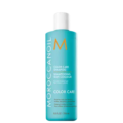 Frasco de shampoo Moroccanoil Color Care, com embalagem em tons de azul e laranja, contendo 250 ml do produto. O rótulo destaca que o shampoo é livre de sulfatos, fosfatos e parabenos, preservando a cor e a vibração dos cabelos coloridos.