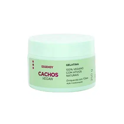 Gelatina vegana da marca Essendy, com a denominação "Cachos Vegan" impressa no rótulo. O recipiente é de cor verde clara, com uma tampa branca. O rótulo destaca que o produto é 100% vegano e contém ativos naturais.