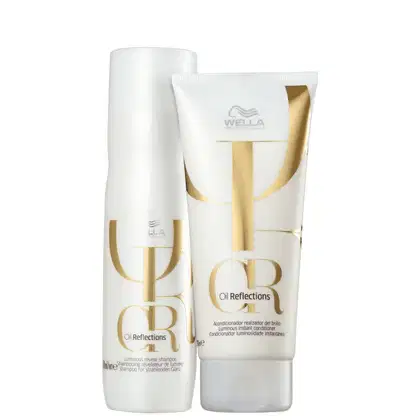 Shampoo e condicionador, embalagens brancas com detalhes dourados.