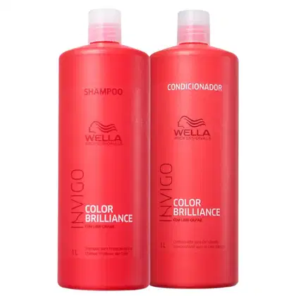 Dois frascos de produtos Wella Professionals, sendo um de shampoo e outro de condicionador da linha Color Brilliance, com embalagens vermelhas e rótulos com o nome da marca e da linha.