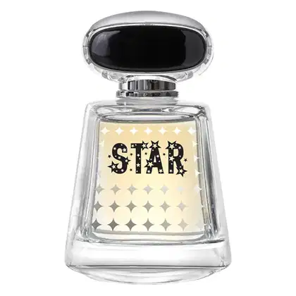 Frasco de perfume de vidro transparente com tampa preta, exibindo o texto "STAR" em letras estilizadas e decoradas com estrelas em fundo claro. O design é elegante e minimalista, com destaque para a marca.