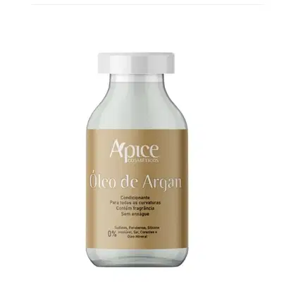 óleo de argan da marca Apice Cosméticos. O frasco é transparente com uma tampa branca e o rótulo exibe o nome do produto "Óleo de Argan" em letras douradas.