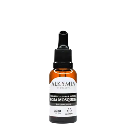Frasco de óleo vegetal puro e natural de rosa mosqueta da marca Alkymia, com rótulo branco e preto em fundo escuro. O produto contém 30ml e é apresentado em embalagem com conta-gotas.