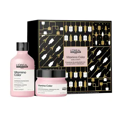 Conjunto de produtos L'Oréal Professionnel da linha Vitamino Color, incluindo shampoo e máscara em embalagens rosa e preta com detalhes dourados, apresentados em uma caixa preta com ilustrações douradas.