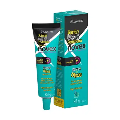 A imagem mostra a caixa e bisnaga da Máscara Capilar Novex Santo Black Poderoso Recarga de Óleos 80g, da Embelleze. O produto é apresentado em uma embalagem verde e preta com detalhes em amarelo. Destaca "Ação instantânea" e "Recarga de Óleos".