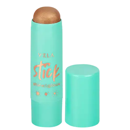 Bastão iluminador da marca Vizzela Cosméticos, em embalagem de plástico na cor verde menta, com rótulo destacando o nome "Stick" e os efeitos "shine & glow".