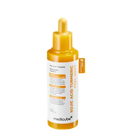 Frasco de soro facial da marca Medicube, contendo 80 ml de produto com fórmula à base de ácido kójico, cúrcuma e vitamina C, para cuidados suaves e reguladores da pele.