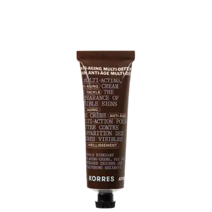 Tubo de creme anti-envelhecimento multi-ação da marca Korres, com rótulo marrom destacando seus benefícios e ingredientes. O produto promete combater os sinais visíveis do envelhecimento.