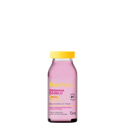 Frasco de 15ml da ampola Desmaia Cabelo da marca Forever Liss, com fórmula para cabelos ressecados e desidratados, contendo ácido hialurônico e óleo de rosa mosqueta, com tampa amarela e rótulo rosa.