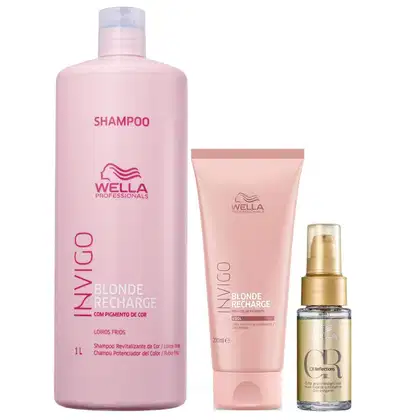Três produtos de cuidados capilares da marca Wella Professionals. O primeiro é um shampoo revitalizante de cor em um frasco rosa de 1 litro. O segundo é um condicionador da mesma linha, em um tubo rosa de 200ml. O terceiro produto é um óleo capilar.