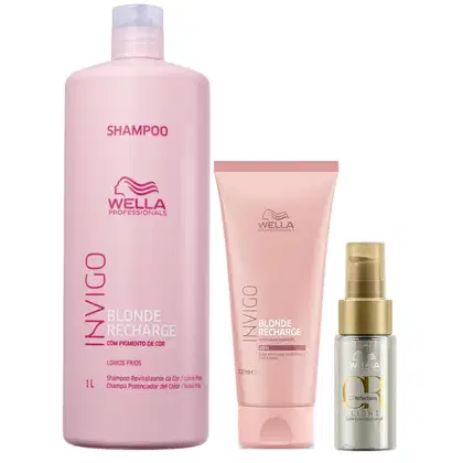 Shampoo Invigo Blonde Recharge em um frasco rosa de 1 litro, com o texto "com pigmento de cor" e "loiros frios". O segundo é um condicionador da mesma linha em um tubo rosa de 200ml. O terceiro produto é um óleo capilar Oil Reflection.