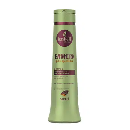 Shampoo da linha Bananeira pós-química da marca Haskell. A embalagem contém informações como a indicação de que é um shampoo para reconstrução e reposição de massa capilar após procedimentos químicos. O frasco possui capacidade de 500ml.