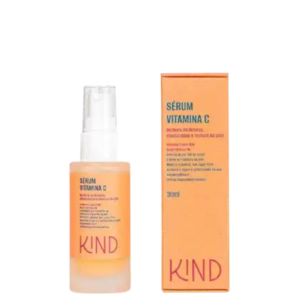 A imagem mostra um frasco pequeno, transparente, fosco, spray, com tampa transparente e rótulo laranja com letras pretas e rosa, indicando tipo de produto, seus ativos e a marca. Ao lado, a caixa retangular com a mesma informação do rótulo do produto.