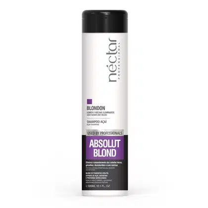 Frasco branco e preto da linha Néctar do Brasil, com rótulo "Absolut Blond" e informações sobre o produto "Shampoo Açaí" para cabelos loiros e mechas iluminadas.