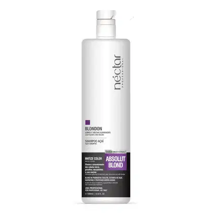 Frasco branco de shampoo Néctar do Brasil Blondon, com bomba dosadora, rótulo com informações sobre o produto "Absolut Blond" e ingredientes como extrato de açaí.