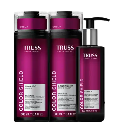 Embalagens de shampoo, condicionador e leave-in da marca TRUSS Professional, com textos "Color Shield" e "Phytic Acid + Chroma Shield Technology" indicando proteção da cor e brilho.