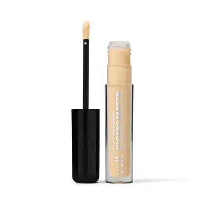 Corretivo Líquido da marca Vult Iconic Matte. Frasco transparente, com aplicador aberto ao lado.
