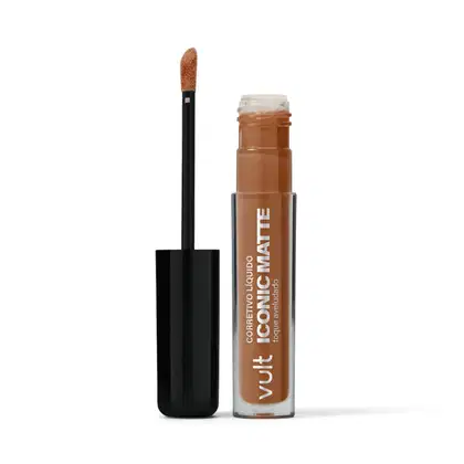 Corretivo Líquido da marca Vult Iconic Matte. Frasco transparente, com aplicador aberto ao lado.
