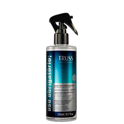 Frasco de spray preto e azul do Uso Obtigatório da marca Truss Professional, contendo 260ml de "Hair Reconstructor", um condicionador líquido para todos os tipos de cabelo, com reconstrução imediata e proteção contra danos.