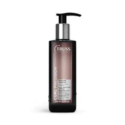 Frasco preto e prata da linha Truss Professional, com bomba dosadora, contendo 250 ml de leave-in para definição dos fios. Rótulo com o nome da marca e indicação de produto para fixação e modelagem dos cabelos.