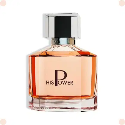 Perfume em frasco retangular de vidro transparente com líquido alaranjado. Possui tampa quadrada preta brilhante. Rótulo com o texto "His Power" em letras pretas sobre fundo bege. Embalagem elegante e sofisticada, com linhas retas e design minimalista.