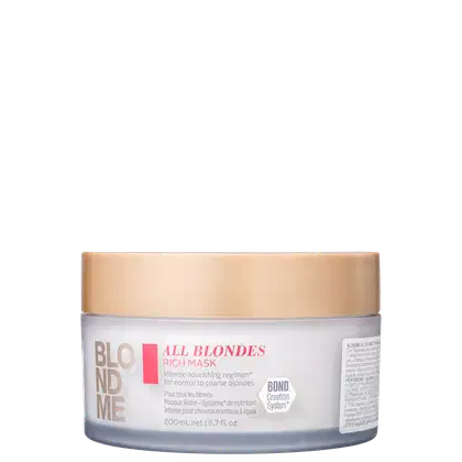 Máscara da linha Blond Me da Schwarzkopf Professional., em embalagem plástica branca com tampa dourada. Rótulo com o nome "All Blondes Rich Mask". Cores predominantes são branco, dourado e vermelho.